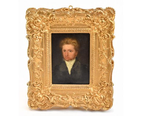 UNATTRIBUTED; 19th century oil on board, quarter length portrait of a gentleman wearing a black overcoat and cravat, 15 x 11c