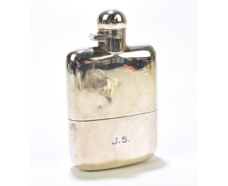 JAMES DIXON &amp; SONS; a George V hallmarked silver hip flask of plain form, with engraved initials 'J.S.', Sheffield 1922, 