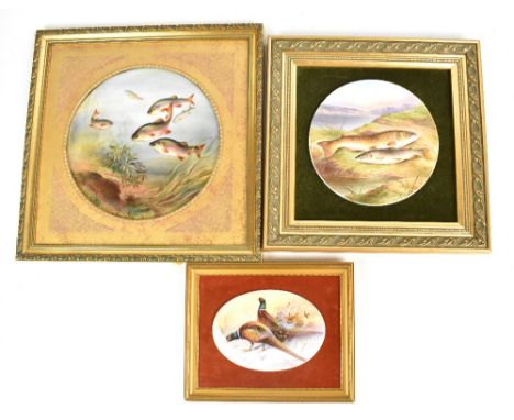 BIRBECK; two hand painted ceramic plaques, each decorated with fish, diameter of largest example 26.5cm, also a further ceram