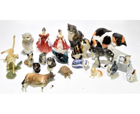 A mixed group of ceramic figures including two Royal Crown Derby paperweights, a rabbit and fox, the former with gold stopper