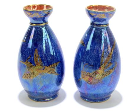 WEDGWOOD; a small pair of lustre ware vases decorated with birds, printed marks to bases, height 12.5cm.Additional Informatio