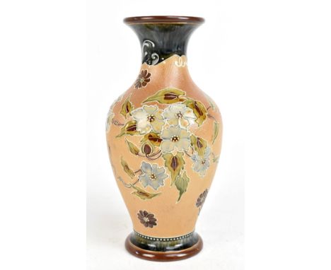 DOULTON SLATERS PATENT FOR ART UNION LONDON; a ceramic vase with tube-lined floral decoration on a textured ground, height 29