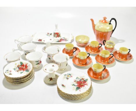 ROYAL ALBERT; a 'Poinsettia' pattern part tea service and a further Art Deco-style orange and yellow glazed coffee service.