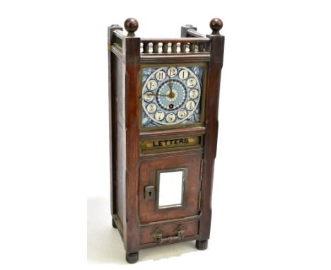 A late 19th/early 20th century oak country house letter box timepiece, the blue and white ceramic dial with eight day movemen