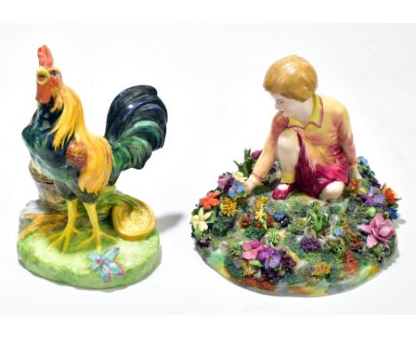 STEPHENSON &amp; HANCOCK (CROWN DERBY); a ceramic figure representing a cockerel standing proud beside a bucket, height 19cm,