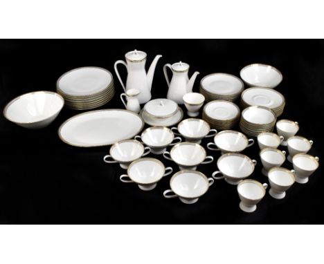 A Rosenthal sixty-two piece part dinner and coffee service, each decorated with a grey border with gilt highlights, comprisin
