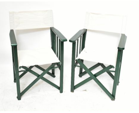 A pair of green painted folding garden chairs, height 88cm, (2).