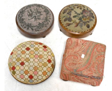 Two Victorian walnut framed circular foot stools with tapestry tops, diameter 29cm, together with two further foot stools (4)