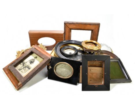 A collection of 19th century and later photograph and portrait miniature frames, including gilt examples, black lacquered exa