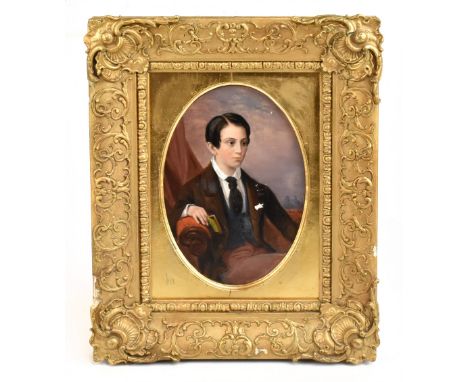 UNATTRIBUTED; a 19th century oval portrait of a boy seated wearing a Ascot style tie, signed 'E.H' and dated 1852, 23 x 15cm,