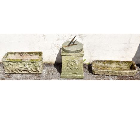 A reconstituted stone garden sundial on associated plinth base, overall height 57cm, diameter of sundial 29cm, together with 