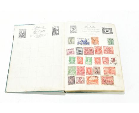 A mid-20th century Royal Mail stamp album with various Commonwealth and International including Brazil, Canada, French Coloni