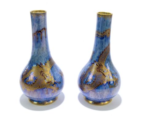 WEDGWOOD; a pair of lustre ware vases decorated with dragons, height 19cm (2).Additional InformationLight general wear.