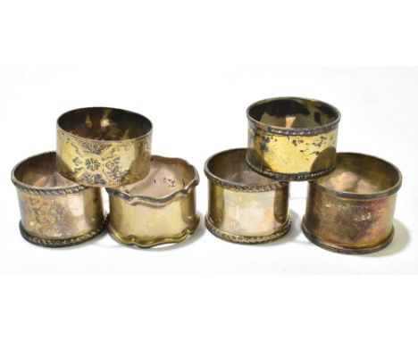 Six assorted hallmarked silver napkin rings, combined weight 4.9ozt/155g (6).Additional InformationAll with general age wear 