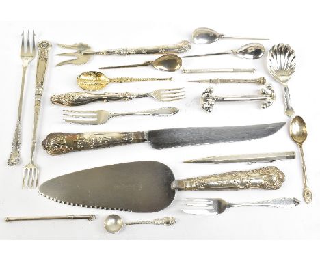 A group of hallmarked silver including a knife rest by Martin, Hall &amp; Co, Sheffield 1910, caddy spoon with shell shaped b