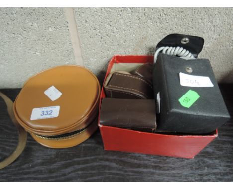 A selection of photographic equipment including a Hunter Bounce II flash shoe, light metres and filters etc