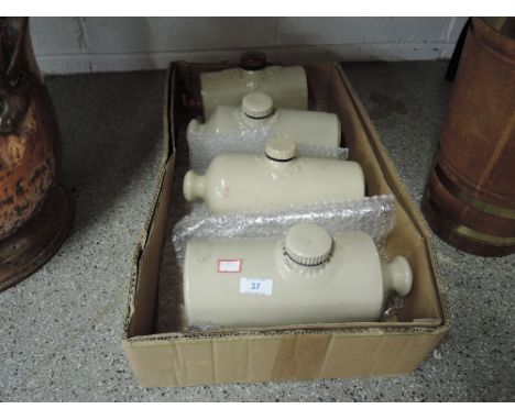 A selection of vintage ceramic bed warmers ideal decorators piece or door stops etc