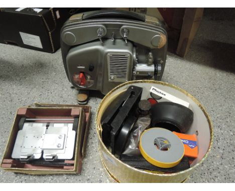 A Bolex Paillard 8mm projector, film splicer and film equipment