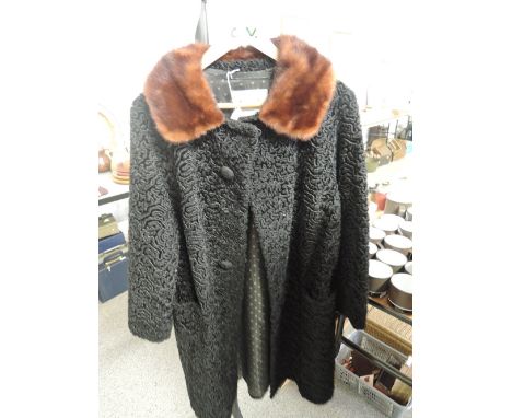 A fur collared ladies coat by Astra Furs Paris