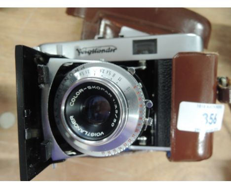 A Voigtlander Vito IIa folding camera with Color-Skopar 1;3,5/50 lens in original makers case