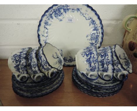 A part tea service unmarked un named in a Delftware style 