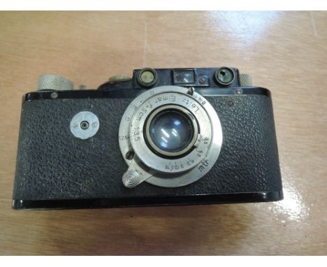 An early Ernst Leitz Wetzlar D R P Leica camera with Leitz Elmar f=5cm 1:3,5 lens