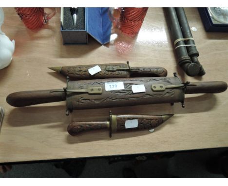 A selection of vintage Indian themed knifes