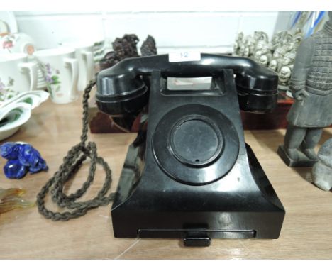 A vintage bakelite telephone by G P O model PL44 No 164