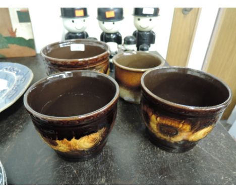 A selection of vintage and retro West German pottery planters and pots