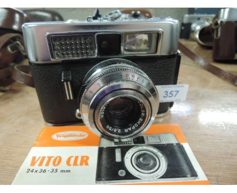 A Voigtlander Vito CLR camera with Color-Skopar 2;8/50 lens and instructions