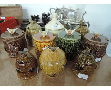 A selection of vintage ceramic lidded honey jars various styles and themes