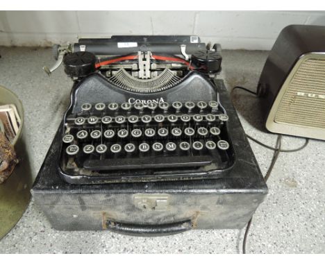 A vintage typewriter by Corona no. L1P00077 with black enamel body and large keys
