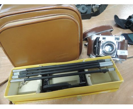 A Kodak Retina IIIc, with a Retina-Xenon1:2.0/50 lens and Compur shutter in original leather case, a Retina Copy Stand and ca