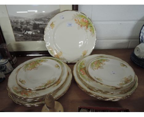 A selection of vintage ceramic plates by Grindley in the Cream Petal pattern
