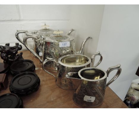 A vintage plated tea set with an ornate inlay design and marked BB to base