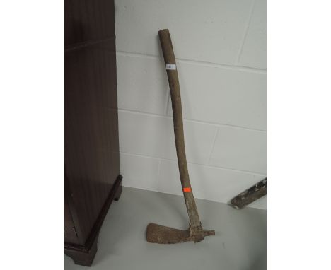 A vintage drain axe