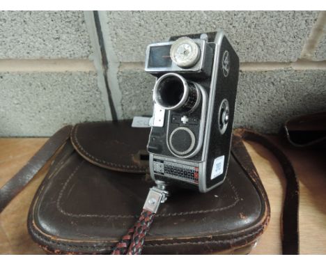 A Bolex Paillard B8L 8mm camera with instruction book in leather carry bag