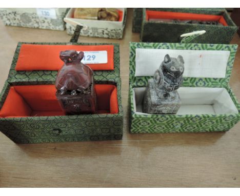 Two stone carved Oriental stamp blocks with figural decal