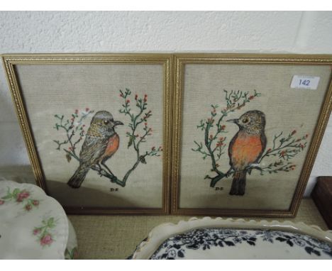 Two vintage hand painted cloth panels depicting two birds