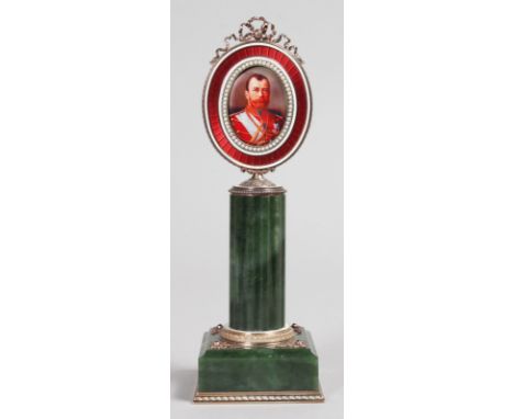 A SUPERB "FABERGE" JADE, ENAMEL AND SEED PEARL PORTRAIT MINIATURE OF NICHOLAS II, on a column with square base. 7.5ins high o