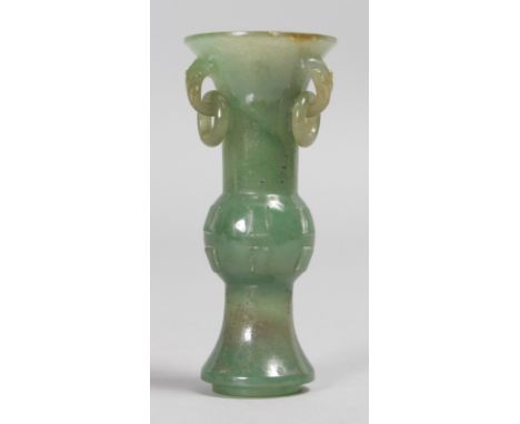 A GOOD SMALL CHINESE JADE VASE with three ring handles. 8cms high.