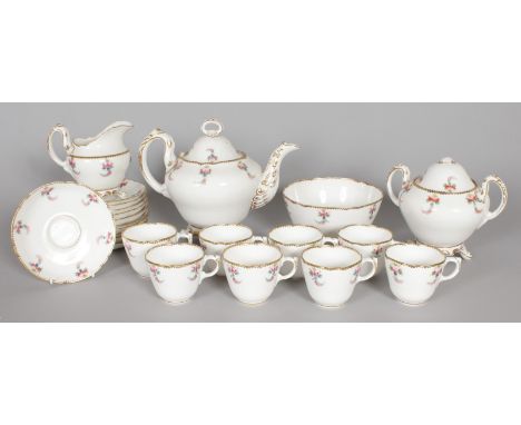 A TEA SERVICE, edged in gilt and painted with red roses, comprising teapot and cover, sucrier and cover, milk jug, slop bowl,