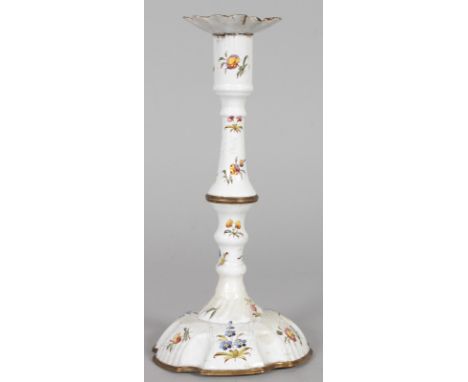 AN 18TH CENTURY BATTERSEA ENAMEL CANDLESTICK. 10ins high.
