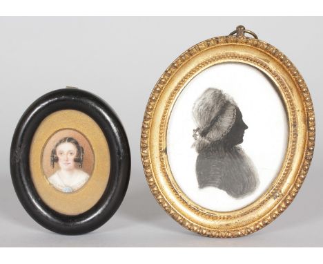 An oval watercolour portrait of a young girl and a black and white portrait miniature of a lady (2).
