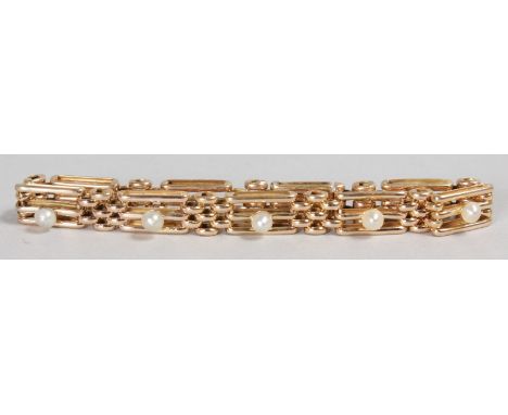 A 9CT YELLOW GOLD AND PEARL SET GATE BRACELET.