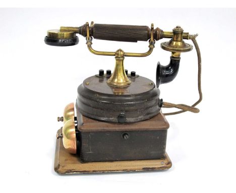 An Early XX Century 'The Magnet' Telephone, the circular body with copper makers plate for 'The General Electric Co K7864', 1