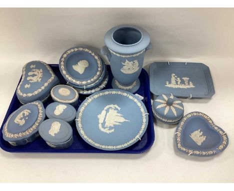 Wedgwood Jasperware in powder blue comprising lidded trinket pots, plates, trays, urn etc. One Tray