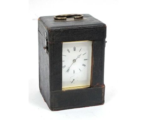 A Brass Cased Carriage Clock, the white enamel dial with Roman numerals and secondary smaller dial with Arabic numerals, leat