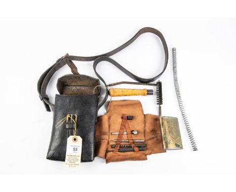A Third Reich MP34 cleaning kit in black leather carrying case, contains an assortment of tools. GC £50-80 