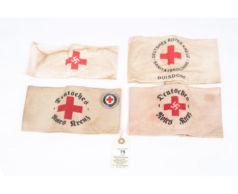 A Third Reich Red Cross arm band, 3 more varying types and an enamel badge. GC £50-60 